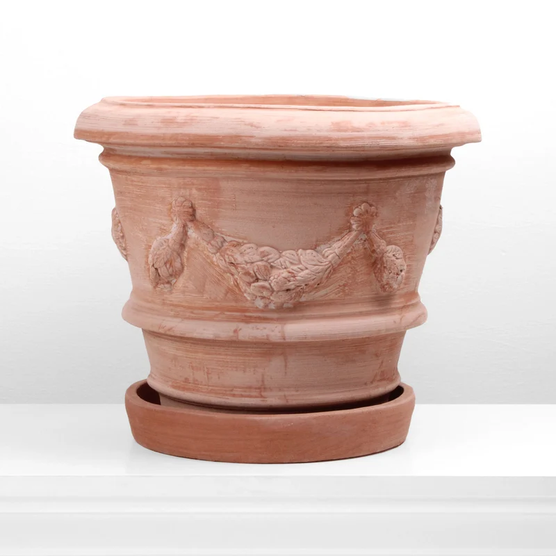 Petit pot de fleurs en terre cuite
